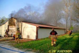 FF`s Pull Hose to South End As Flames Vent Roof