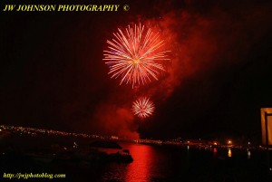 Bright Red Bursts Over Bay