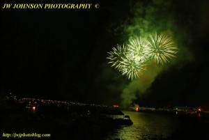 Green Bursts Above Bay