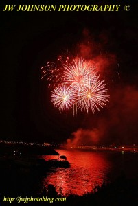 Red Bursts Over Bay