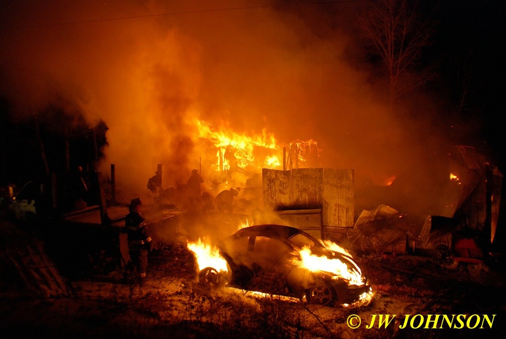 Acetylene Tanks Behind Beetle