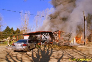 04 Trailer and 3 Sheds Well Involved