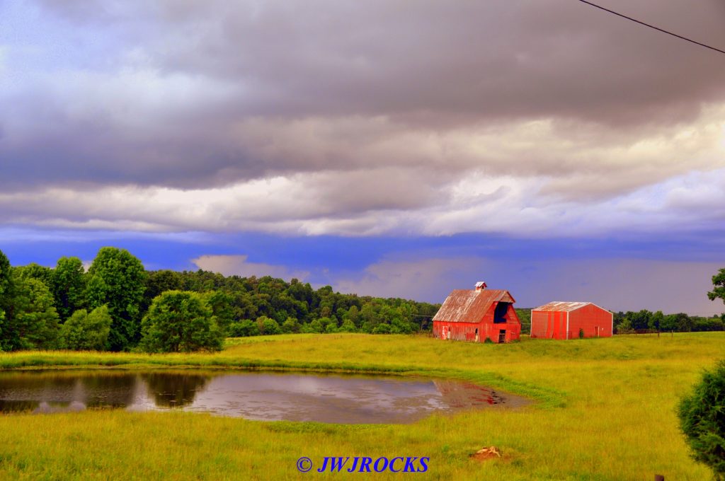 34 Storm Behind Horse Barns